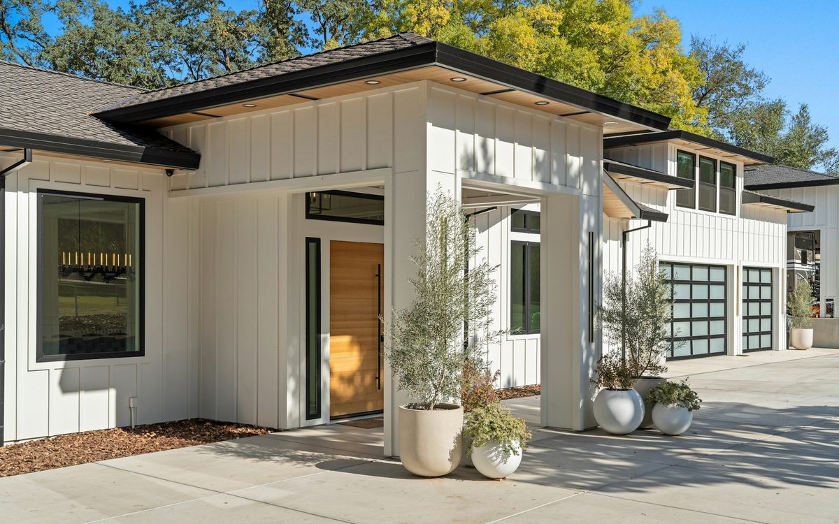 Modern white weatherboard home with fresh paintwork